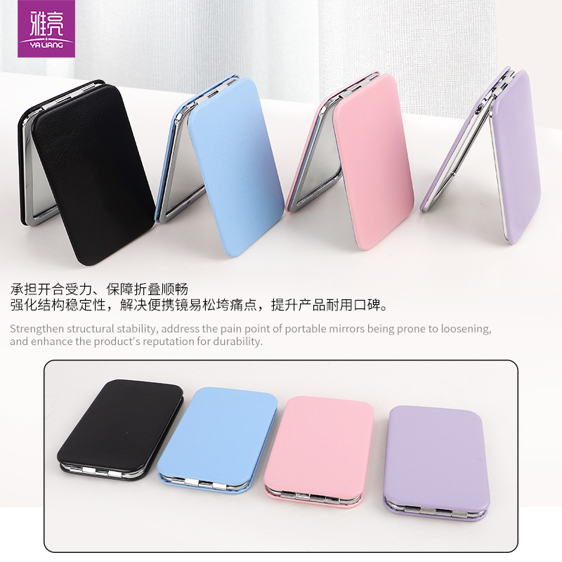 Spot al por mayor personalidad creativa celebridad de Internet PU portátil espejo de maquillaje plegable 97 espejo de moda rectangular espejo de doble cara
