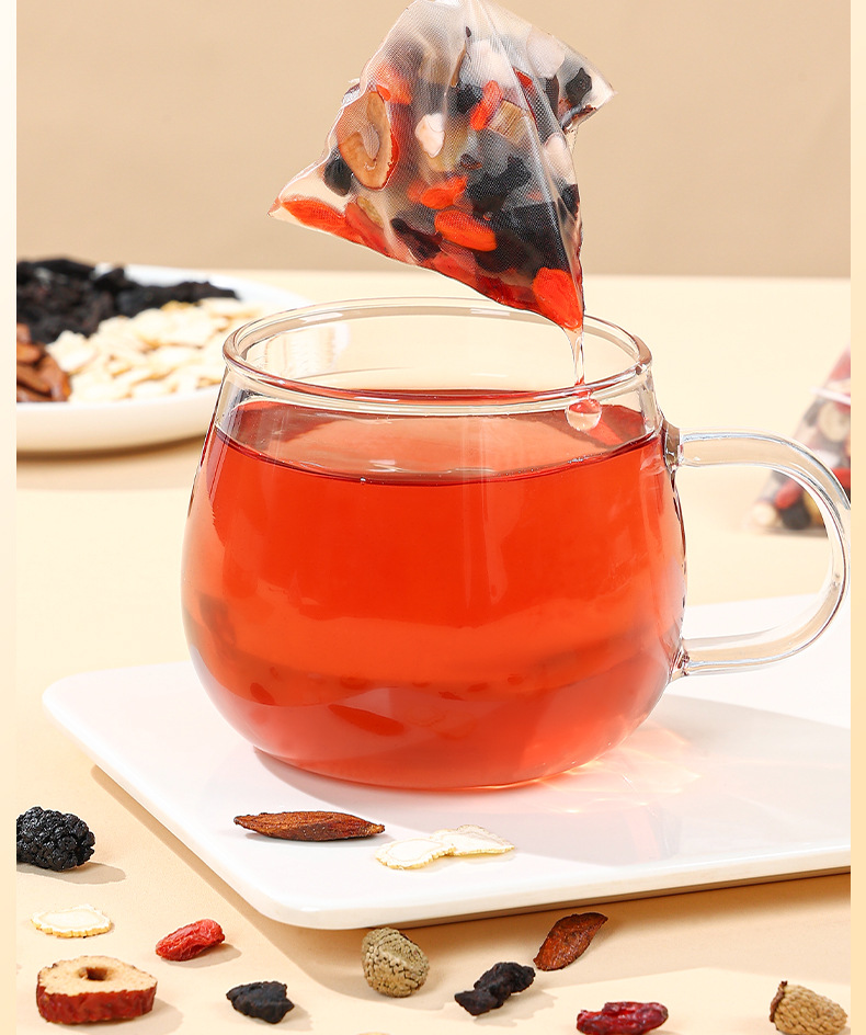 Five Treasure Herbal Tea Bags with Ginseng Huangjing Mulberry Goji Raspberry Cornus and Black Bean 300g in use
