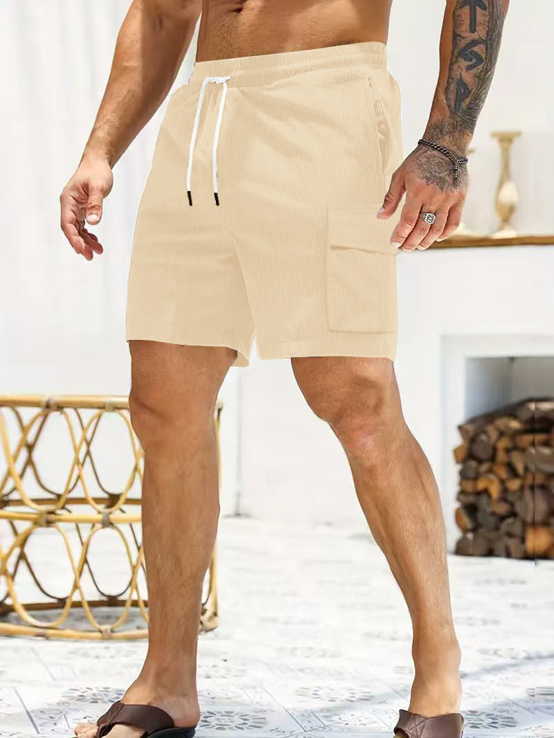 Pantalones cortos de ropa de trabajo para hombres transfronterizos nuevos pana de color sólido en verano pantalones cortos casuales de bolsillo múltiple para hombres simples
