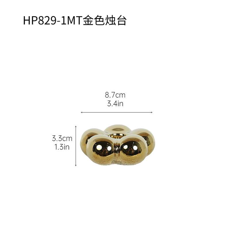 Decoraciones de cerámica dorada moderna simple transfronteriza sala de estar mesa vela asiento decoración de boda props