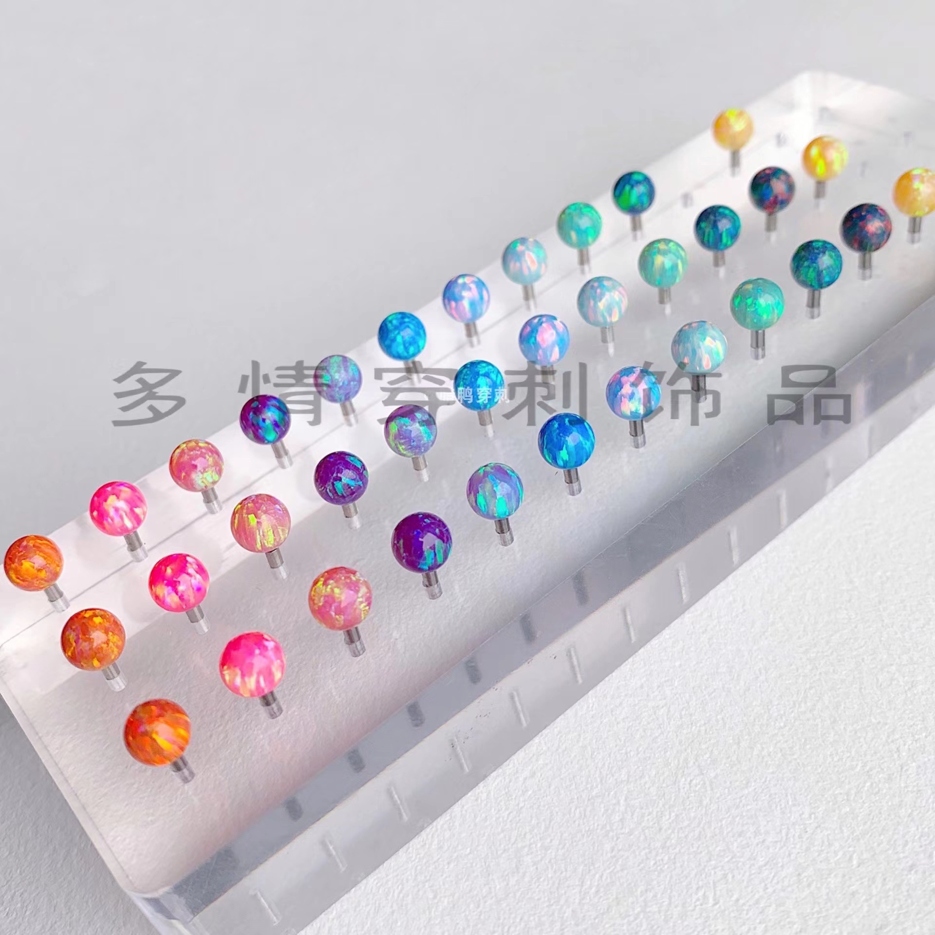 Silver pointed spike labret stud material detail