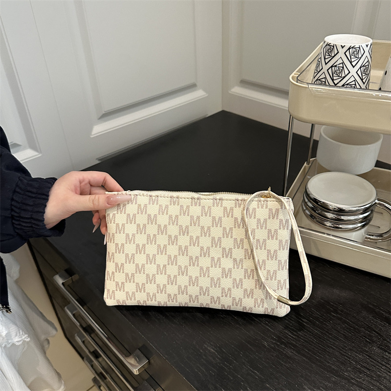 Impresión cuadrada otoño e invierno bolsas de mano casuales universales para mujeres de alta calidad temperamento simple nicho de moda bolsas de cena
