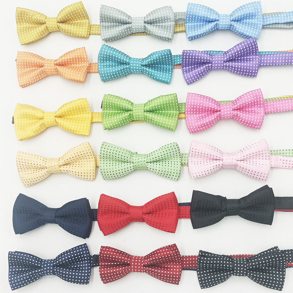 Lugar del fabricante Versión coreana de la pajarita para niños de doble capa para estudiantes de primaria hilo de poliéster teñido en hilo de seda color sólido accesorios para mascotas lazo