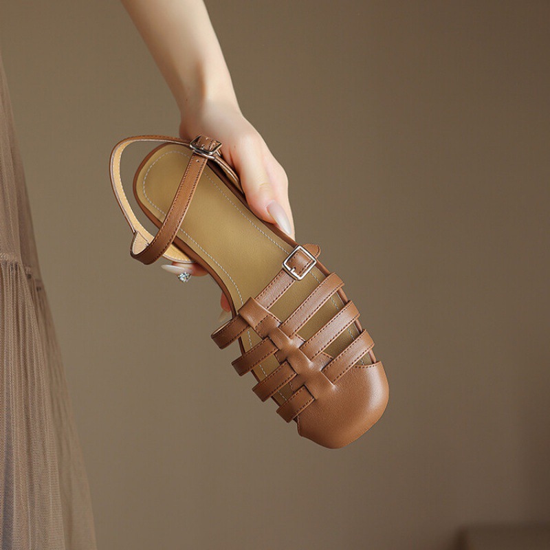 Beige fashionable summer sandals flat