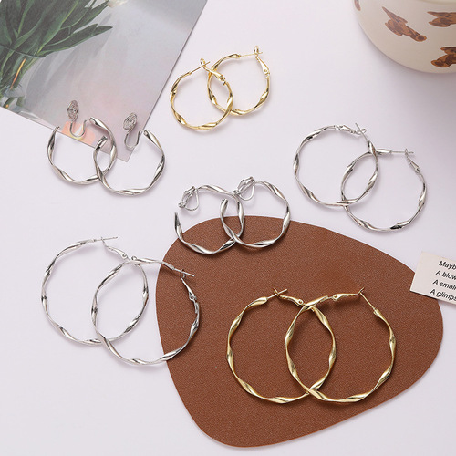 INS style internet celebrity same style simple temperament personality light curved large circle earrings French style mosquito coil ear clip earrings
