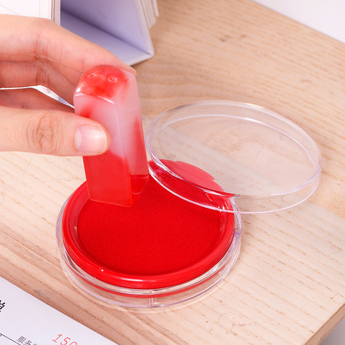 Deli ink pad 9863 round quick-drying water-resistant mud office financial atomic printing ink red / blue