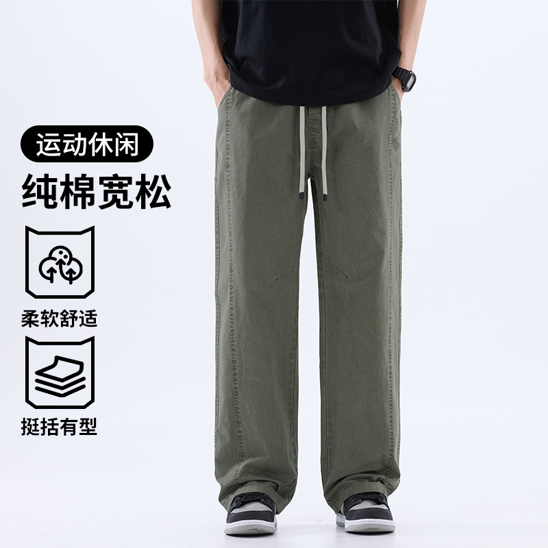 綿のカジュアルなズボンの男性のストレートのゆったりしているズボン2025夏の薄いタイプのファッションの防風傘兵の広い足のズボンの男性