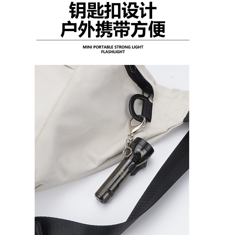 Llavero al aire libre transfronterizo luz de la herramienta de emergencia luz multicolor luz fuerte linterna ultra-pequeña linterna portátil