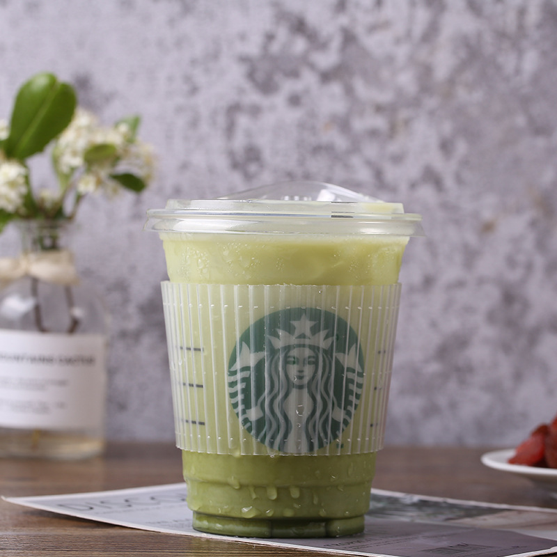 One-time use plastic transparent cup sleeve with leak-proof, heat-insulating, and cold-insulating features, paired with a leak-proof paper pad to prevent overflow and seepage.