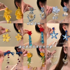 明るい島〜ホリデースタイルの黄色の花びらタッセルイヤリング女性の顔が見える小さな海辺のイヤリング誇張された2025新しいスタイル