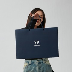 衣料品店のハンドバッグ女性の紙袋バッグ衣類用のポータブル紙袋カスタム紳士服店のハンドバッグ紙袋