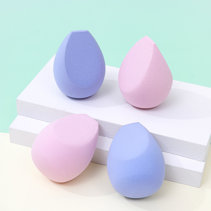 Fábrica personalizada de huevo de maquillaje de tres cuchillos polvo de maquillaje no comer polvo de maquillaje de doble uso esponja de maquillaje huevo de maquillaje al por mayor transfronterizo