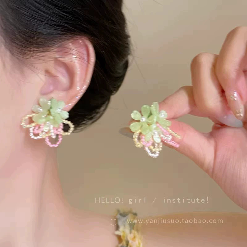 2026 viento falso sensación de atmósfera super inmortal pendientes de flores de malla temperamento suave de chiffon para mujeres pendientes