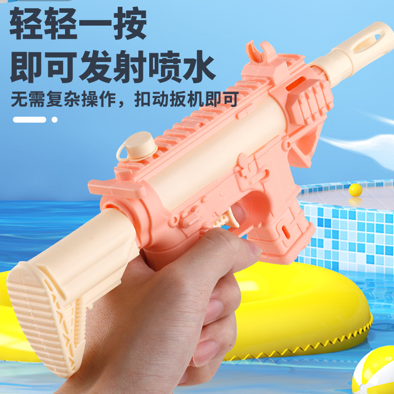 Nuevo juguete de pistola de agua para niños Juego de playa de verano botón al por mayor lindo color caramelo pequeña pistola de agua salpicaduras de agua Festival