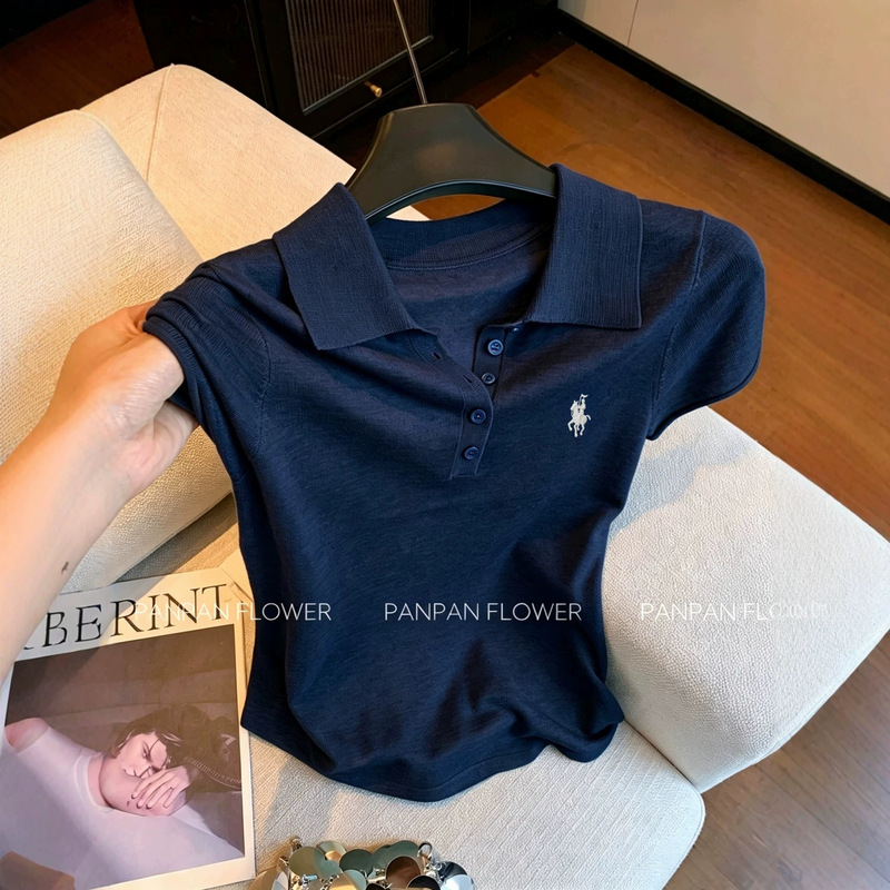 Navy blue polo-neck short-sleeve knit top with a small horse embroidery, a classic and stylish design for women, perfect for summer workwear and creating a slimming silhouette