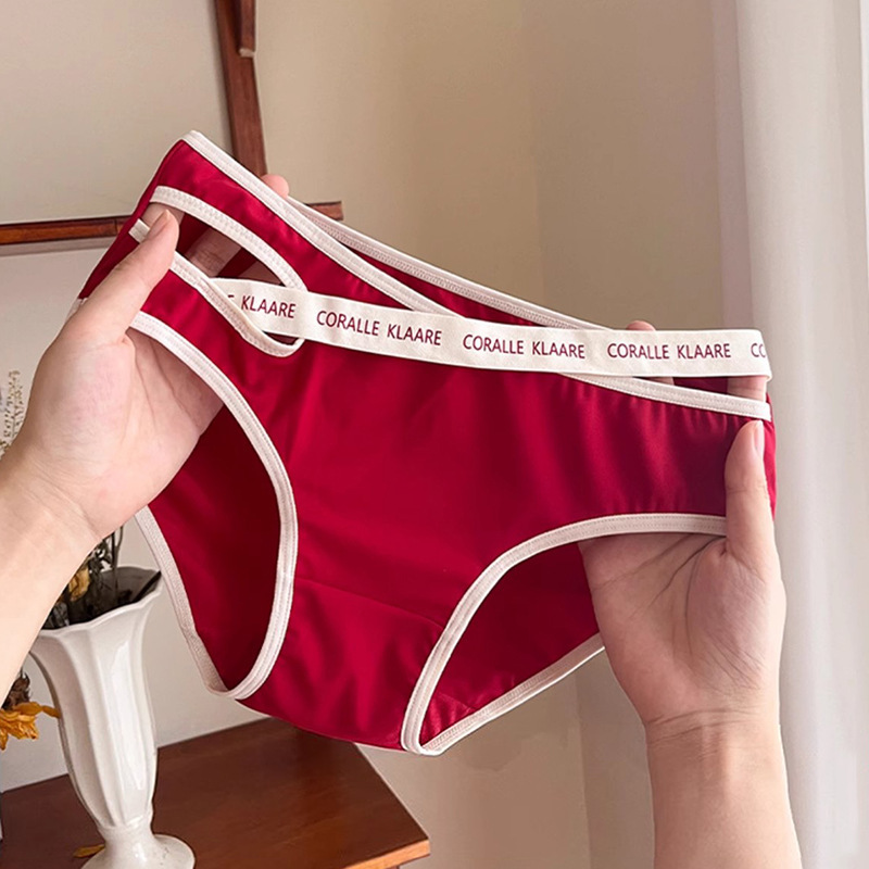 High-grade light luxury birth year red underwear women's sexy pure Want to hollow out chic with cross briefs suit