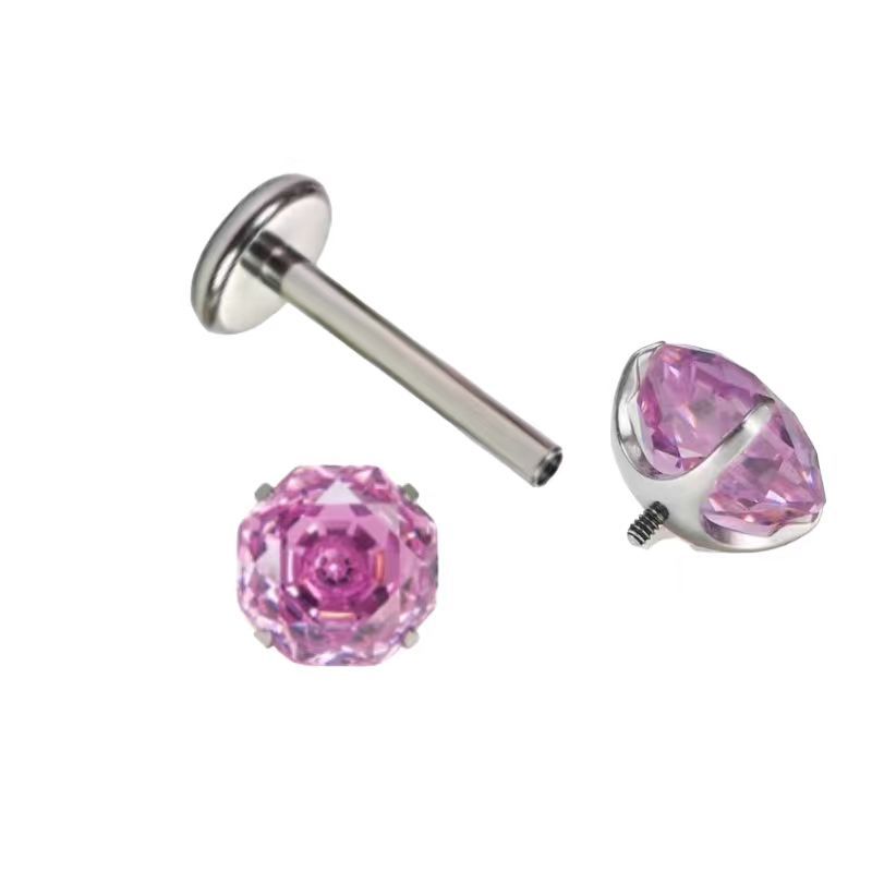 Silver pointed spike labret stud material detail