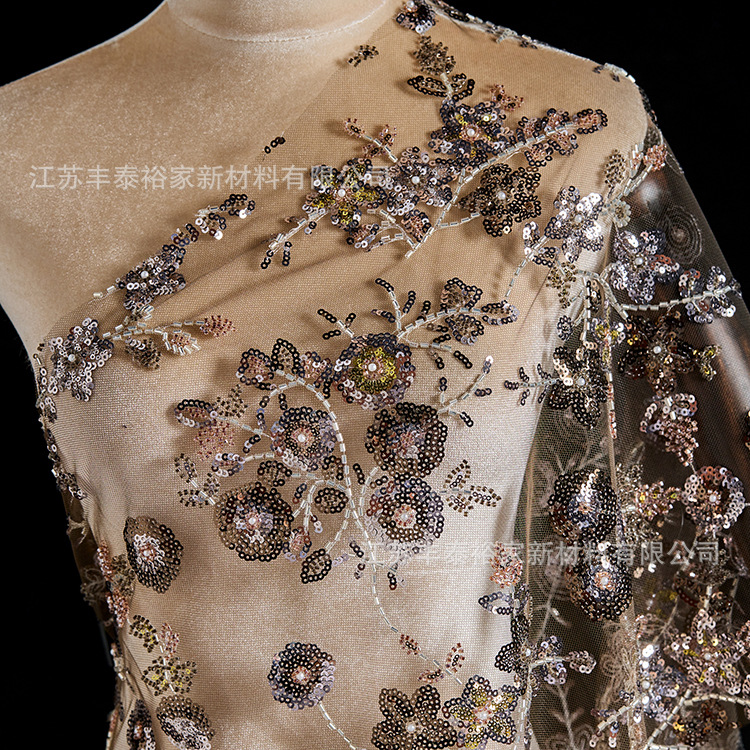 Tejido personalizado bordado sequinado tela bordada tela de cuentas de alta calidad europea y americana bordada malla vestido de plata