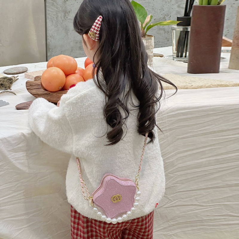 2026 nuevo bolso de niños brillante estrella de pentacos bolso de perla exquisito mini bolso accesorios para hombres y mujeres