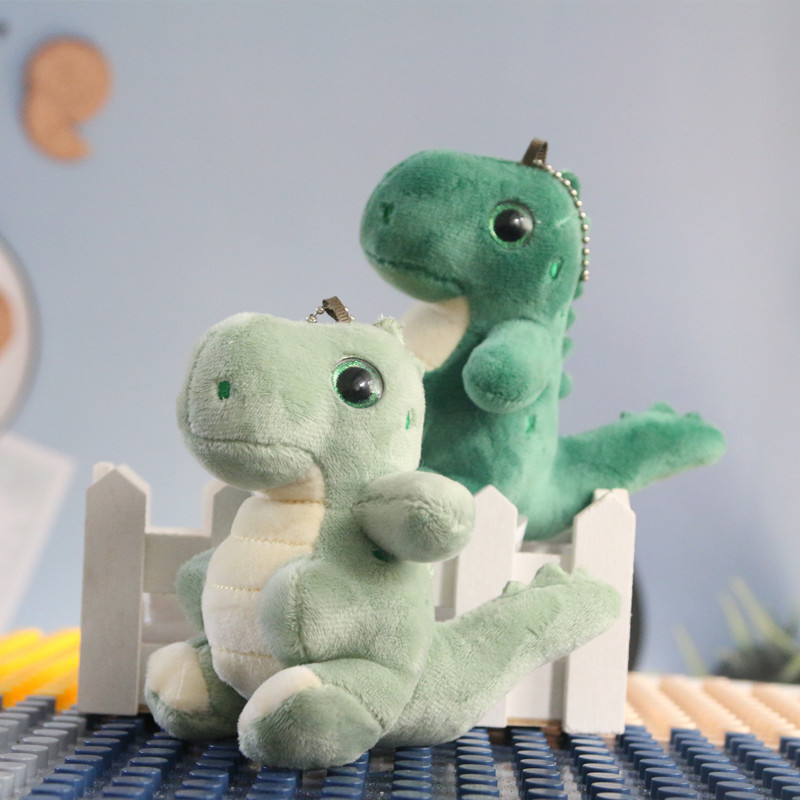 Pequeño dinosaurio muñeca de peluche llavero mochila colgante lindo Tyrannosaurus muñeca pareja mochila accesorios colgantes moda
