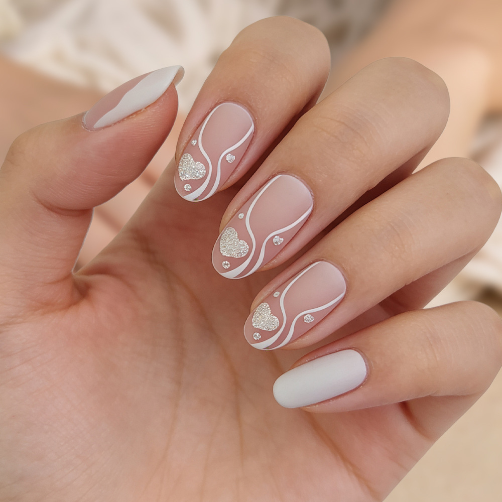 Uñas de uñas largas portátiles Parche de uñas postizas desmontables Sensación de alto nivel Venta al por mayor de uñas portátiles de venta caliente transfronterizas