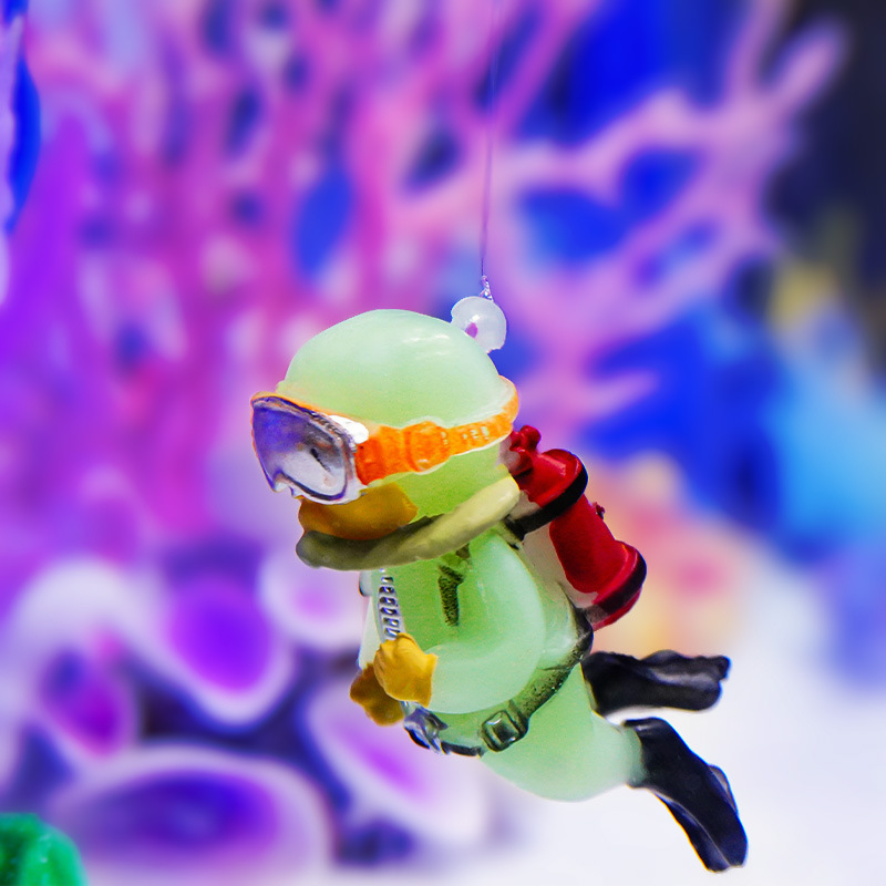 Nuevo adorno decorativo para acuarios de peces, con forma de cámara flotante verde, de color azul fluorescente, ideal para decoración de peceras.