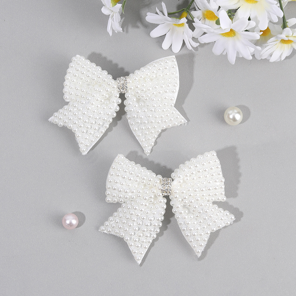 2개입 진주 나비 장식