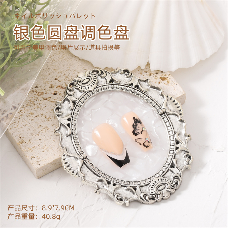 Paleta redonda de plata