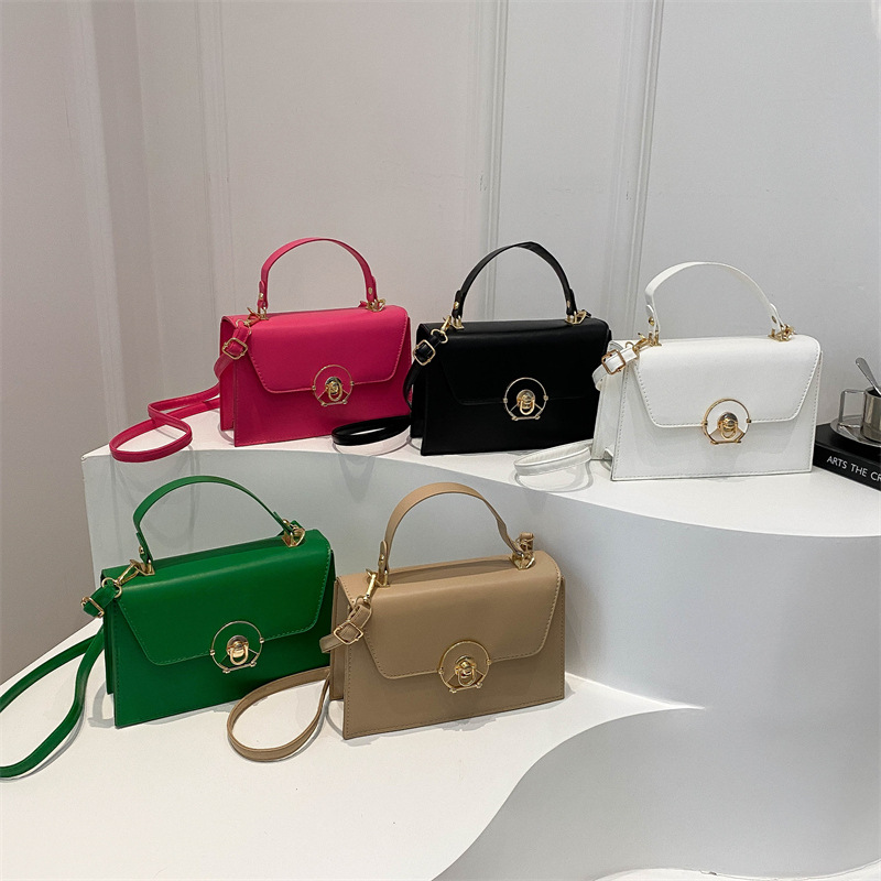 Textura bolso de moda bolso femenino 2024 verano nuevo estilo moda diseño de nicho bolso de hombro caja de estilo occidental bolso de mensajero