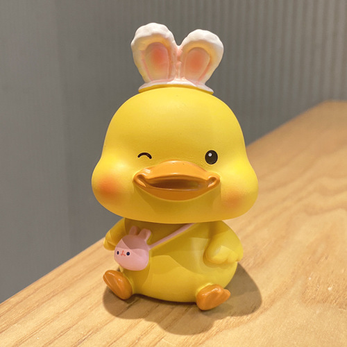 Creative MOMO yellow duck head-bobbing ornament car decoration for women cute yellow duck office decoration internet celebrity car interior