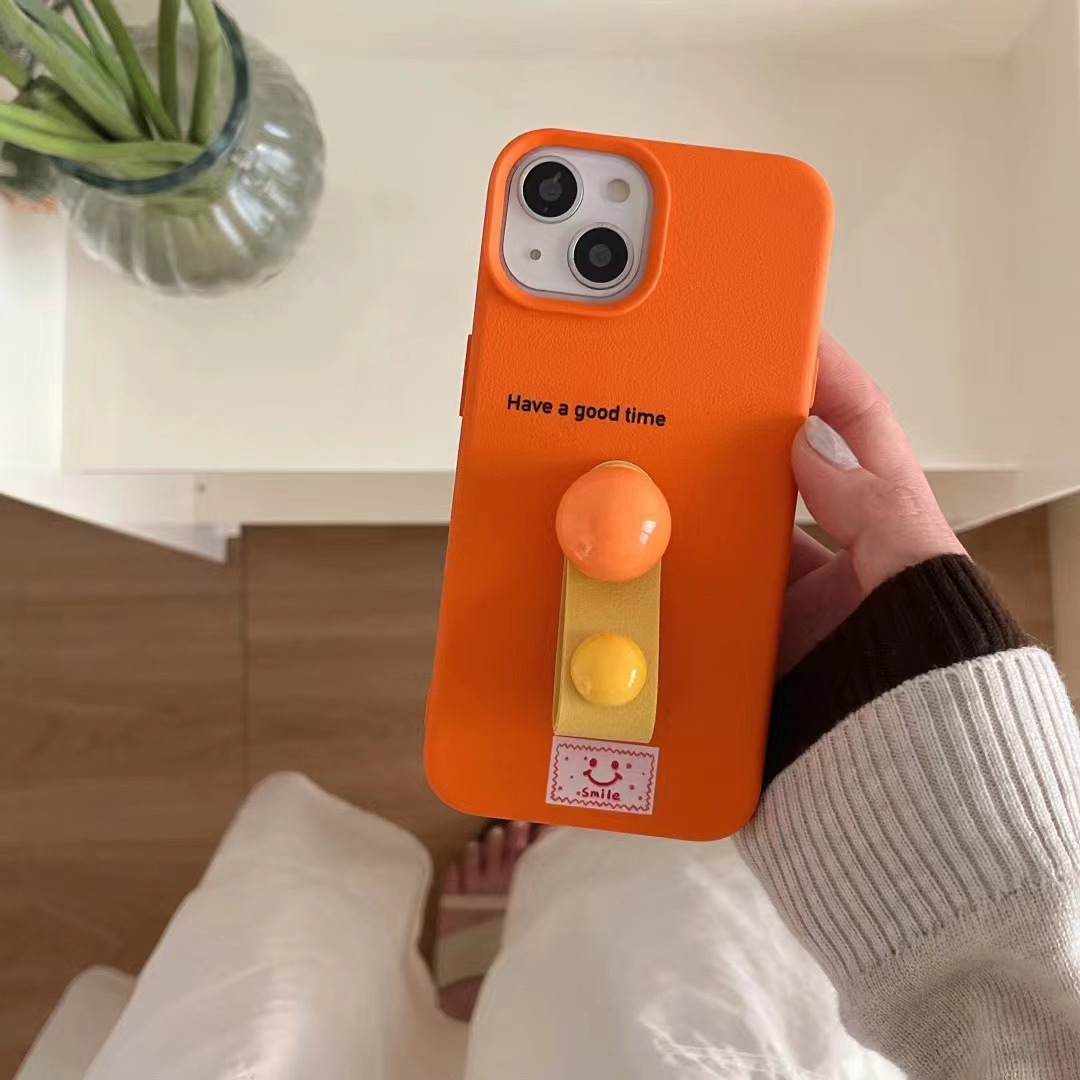 Botón de dedo de bola tridimensional de color sólido simple ins para iPhone15ProMax Apple 13/12 funda para teléfono móvil 14 mujer