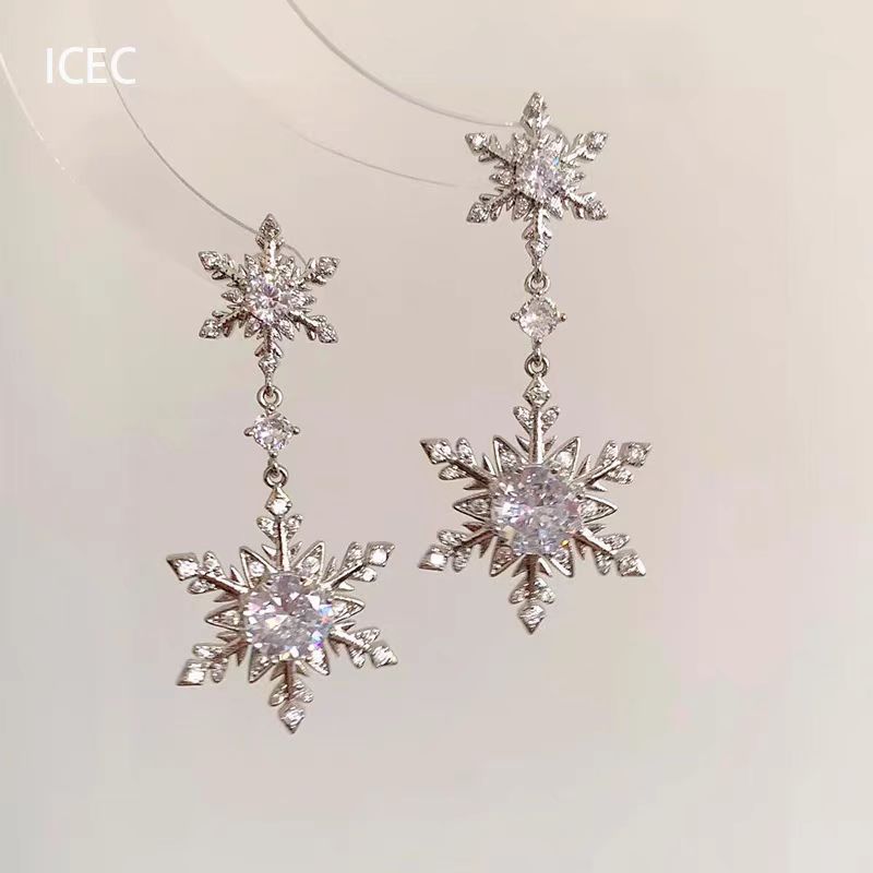 フランス式の清冷感の銀色の金属のイヤリングの真珠のドリルのフリンジデザイン感の耳飾りのファッションの高い顔の値の女性の耳飾り