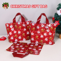 国境を越えた売れ筋クリスマスクリエイティブプラスチックハンドバッグ卸売漫画包装袋クリスマスツリープリントギフトバッグ
