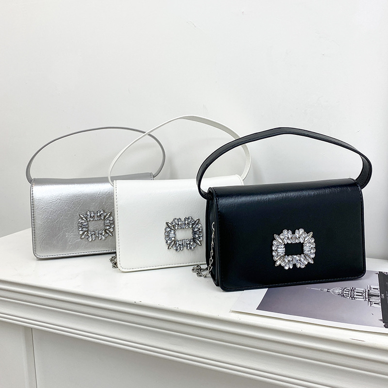 Bolso bandolera transfronterizo para niñas, sentido avanzado, nuevo bolso cuadrado pequeño de un solo hombro de cadena simple, bolso con cerradura de diamante brillante de moda