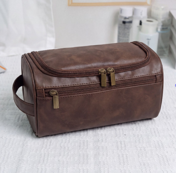 Nueva bolsa de cosméticos transfronteriza europea y americana de almacenamiento a prueba de agua de gran capacidad bolsa de lavado de cuero de viaje bolsa de almacenamiento multifuncional