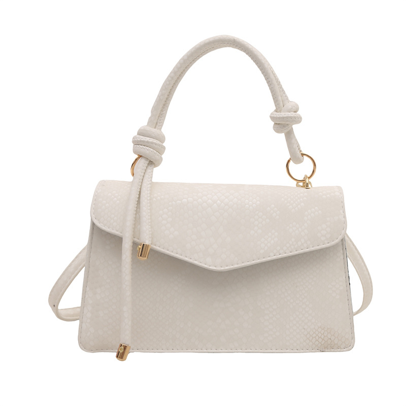 Bolso con estampado de piel de serpiente de diseño de nicho de lujo ligero transfronterizo para mujer 2025 nuevo bolso de mensajero de un solo hombro
