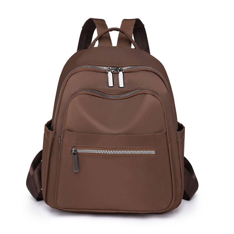 Transfronterizo al por mayor 2023 nueva mochila de nailon para mujer coreana simple y versátil mochila de viaje anti-salpicaduras de agua mochila escolar