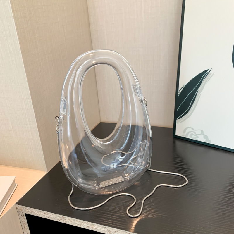 Textura transfronteriza cadena bolsa casual otoño / invierno 2025, nueva bolsa de hombro acrílica, bolsa de mujer de moda transparente