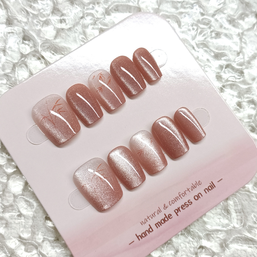 Nuevas puntas de uñas hechas a mano de estilo chino, juego de diez piezas de cristal ojo de gato para decoración de uñas, pegatinas cortas de bambú rojo ojo de gato para uñas.