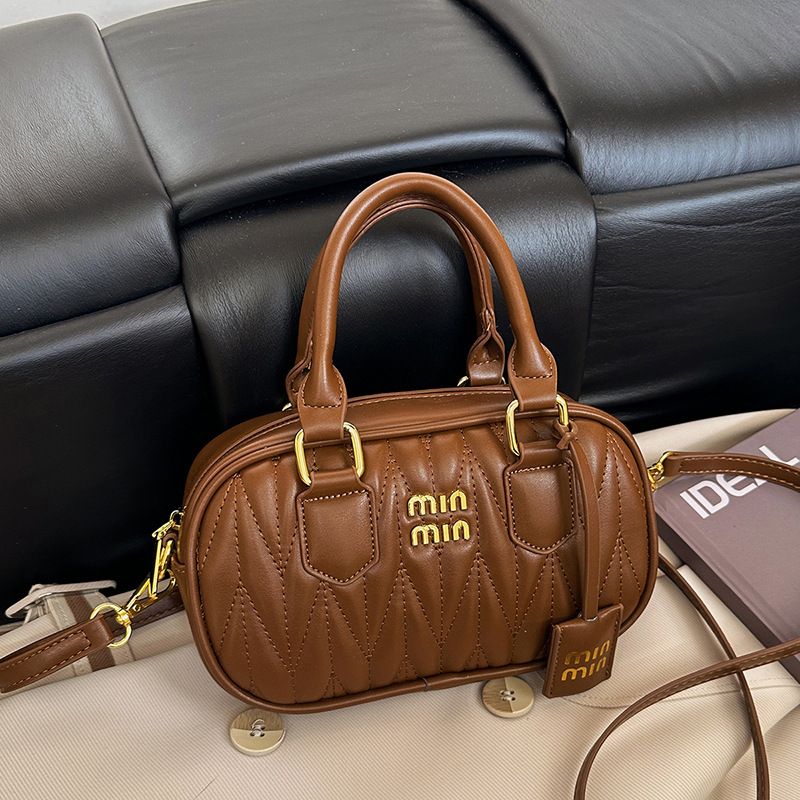Bolso de mujer transfronterizo nuevo nicho coreano bolso de mano plegado Boston exquisito lujoso, ligero y versátil bolso de hombro.