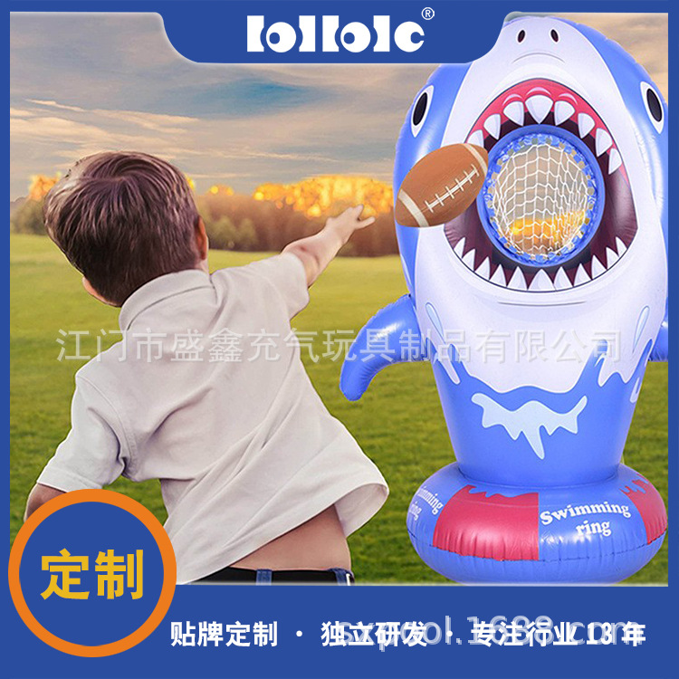 Travel inflatable shark play in water