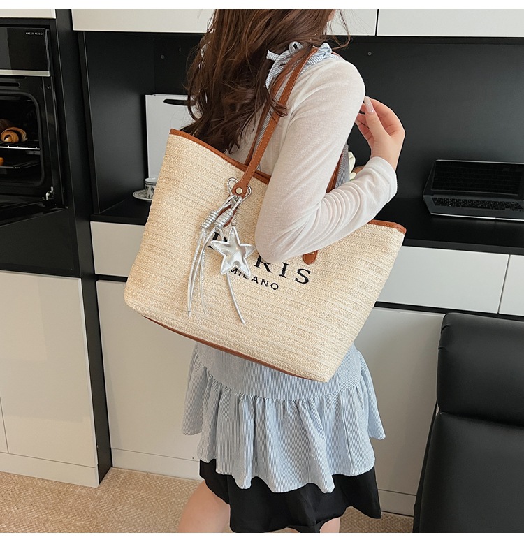 Summer striped woven large-capacity tote bag 2025 New style fashionable and trendy Korean style simple and elegant casual single-shoulder bag undefined