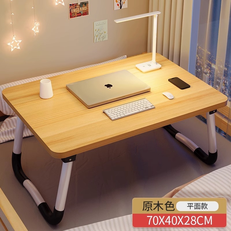 折り畳み式のベッドの上の小さい机のコンピュータの机の学生の寮の上で学習の机を敷きます。|undefined