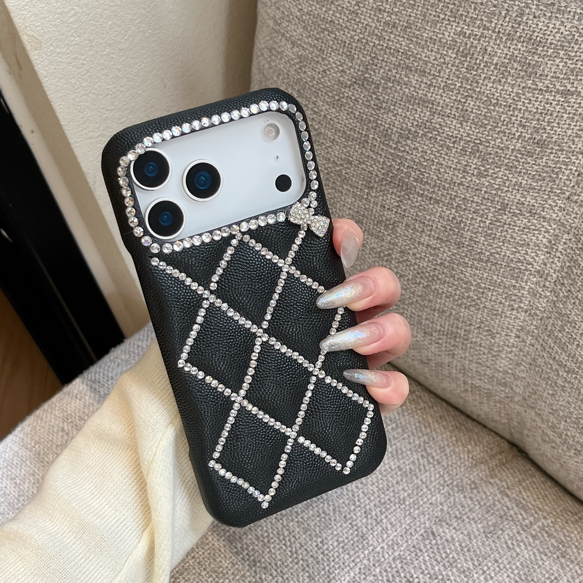 高级感皮纹网格线条钻蝴蝶结手机壳适用iPhone17ProMax防摔保护套