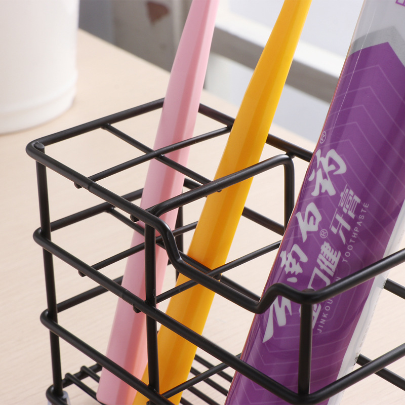 Cepillo de dientes de escritorio de cuatro rejillas negro Estante de almacenamiento de pasta de dientes Baño libre de instalación Enlucido bucal Estante de almacenamiento de taza Drenar cepillo de dientes poroso