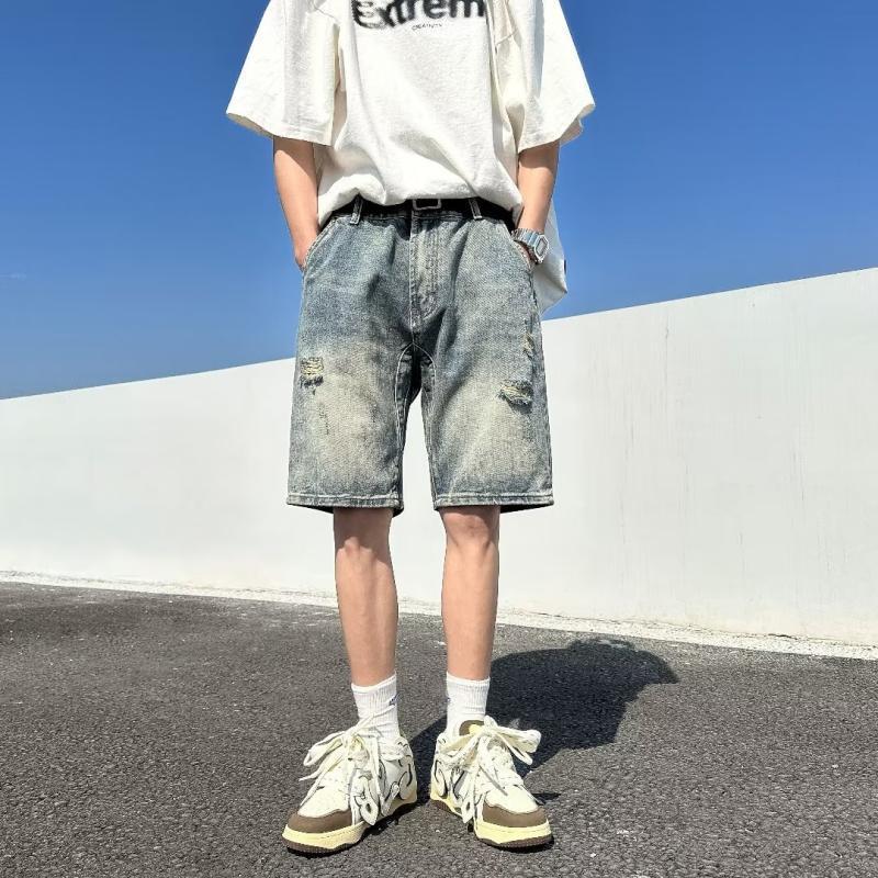 Pantalones cortos de jeans agujeros de verano delgados para hombres 2025 nuevos pantalones vintage estadounidenses sueltos marca de tendencia pantalones de tamaño grande