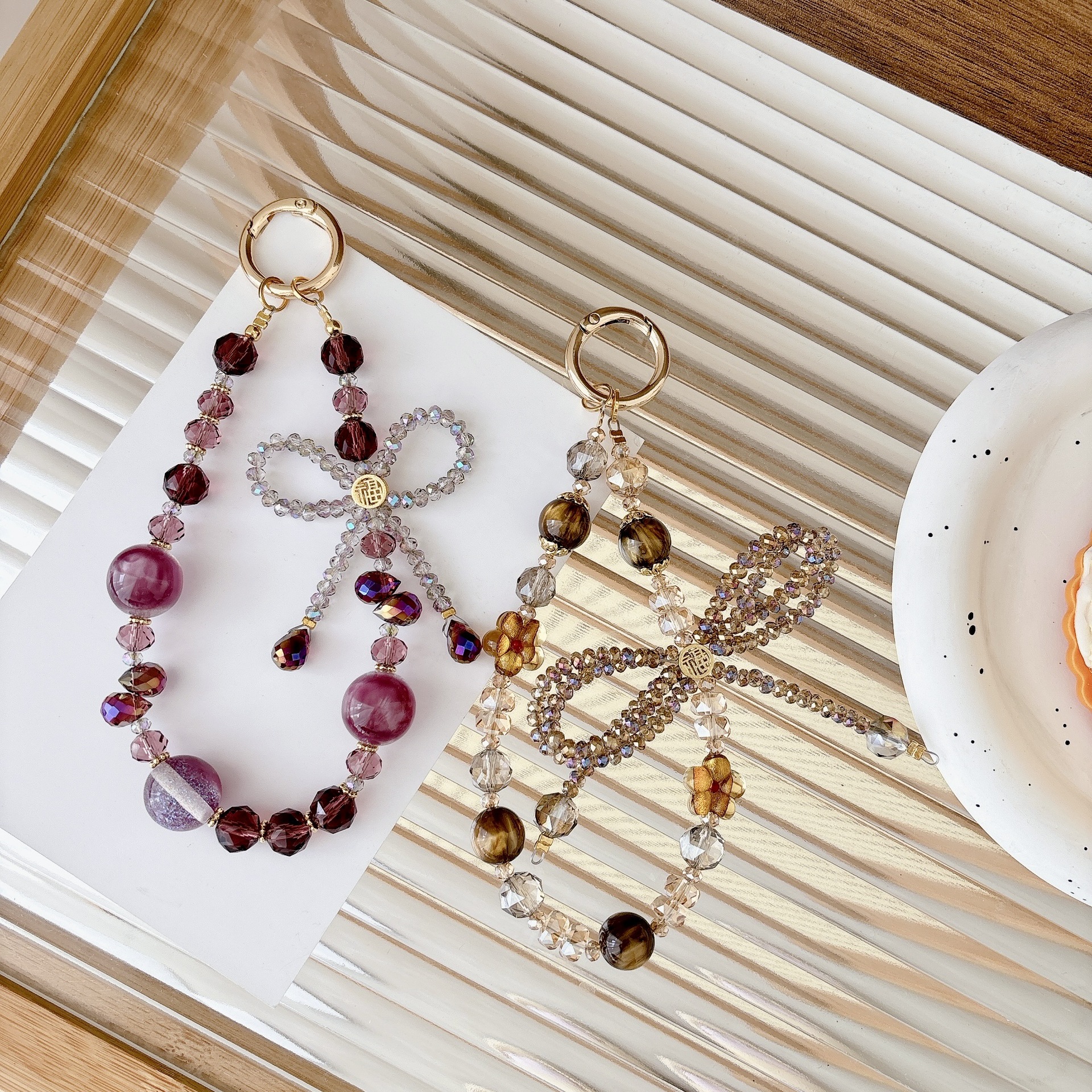 El arco de lujo ligero de lujo de alto nivel puede luchar, cadena de teléfono móvil, colgante de teléfono móvil, bolso, llavero, colgante, nicho de diseño