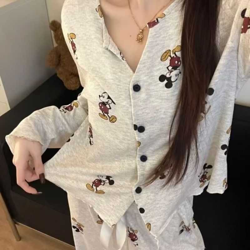 Pijamas al por mayor transfronterizos primavera y otoño nudos de seda de hielo hilo de moda cardigan de manga larga pantalones largos set de ropa para el hogar