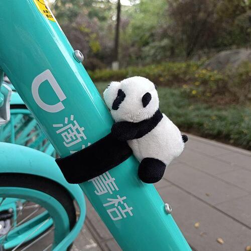 Bicycle panda lying on the electric car, motorcycle, motorcycle doll, small pendant, decorative slap circle, slap circle ornament