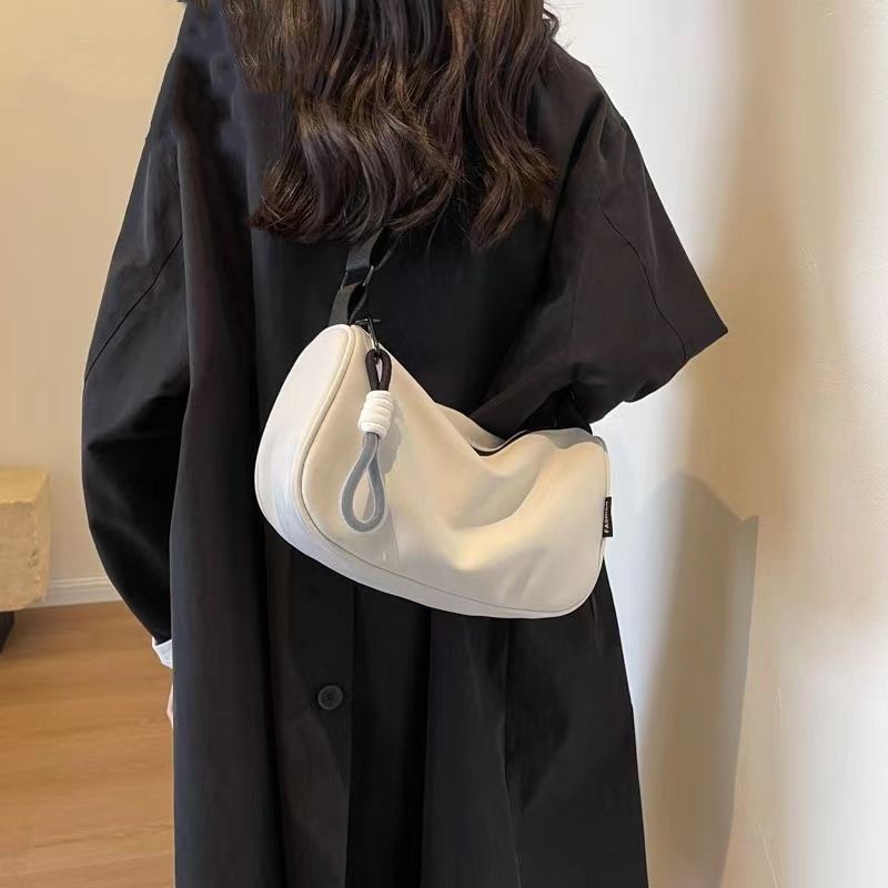 新しいカジュアル大容量ナイロンキャンバスバッグ女性のファッションショルダーバッグ多用途ワイドバンドメッセンジャー枕バッグ|undefined